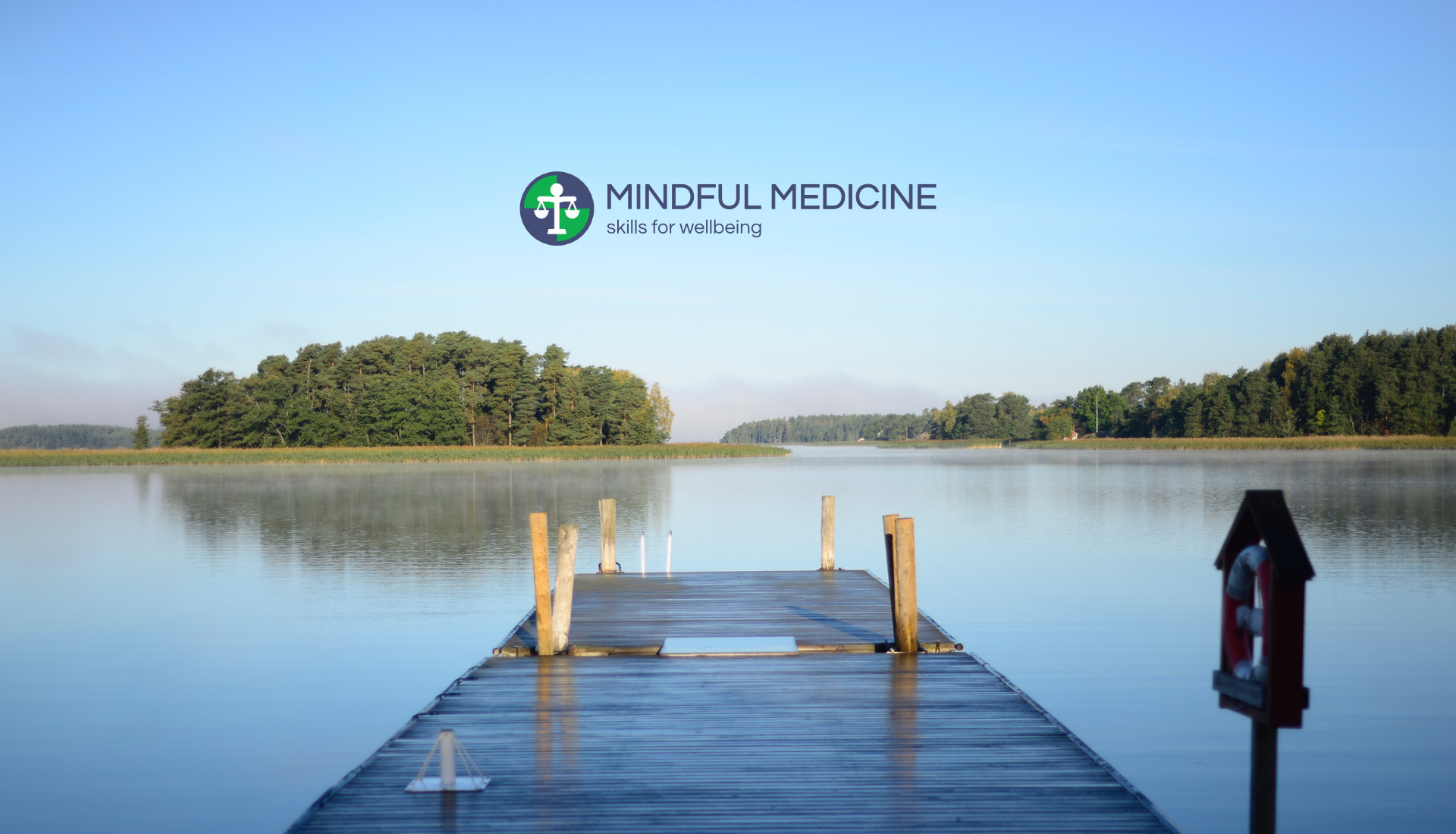 Photo of jetty and tranquil lake